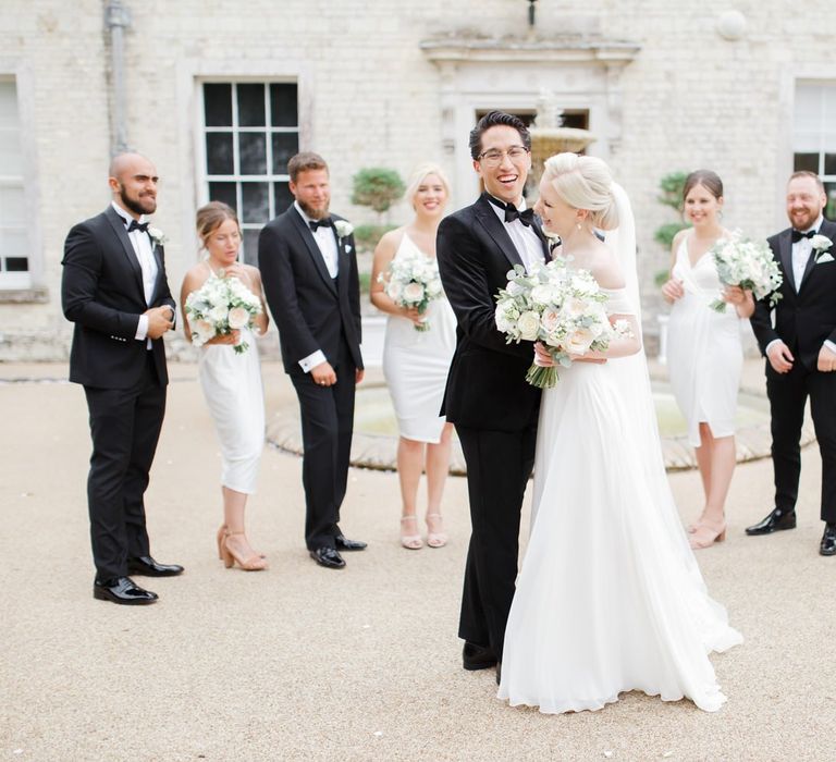 Wedding party in black tie attire at Froyle Park wedding