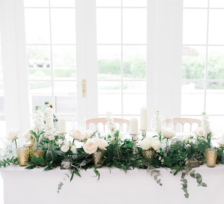 Top table white and green wedding flowers