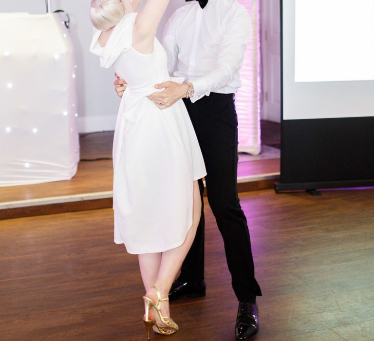 Bride and groom perform dirty dancing routine at Froyle Park wedding