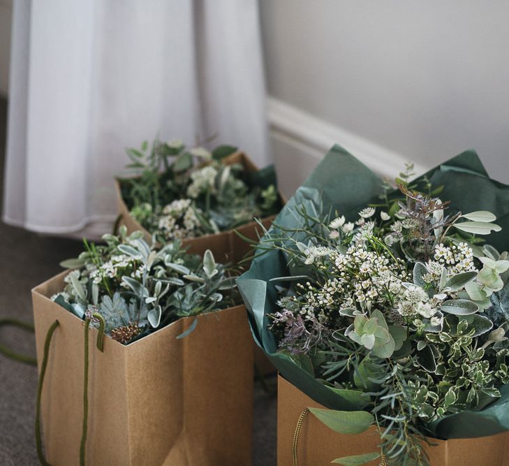 Green and white foliage for wedding flowers at London wedding