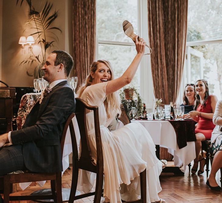 Bride and Groom Playing Mr &amp; Mrs Game