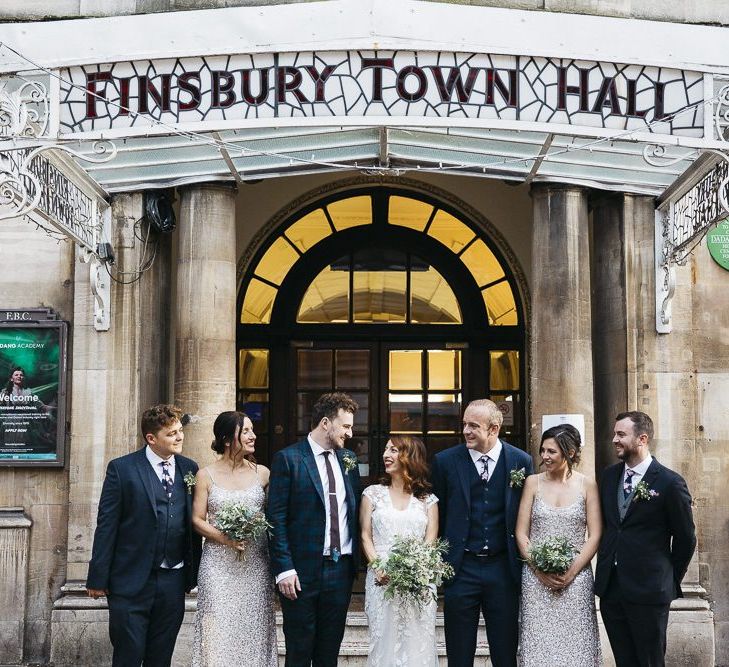 Bride wearing Phase Eight Wedding Dress with her  Groom and guests at Finsbury Town Hall reception