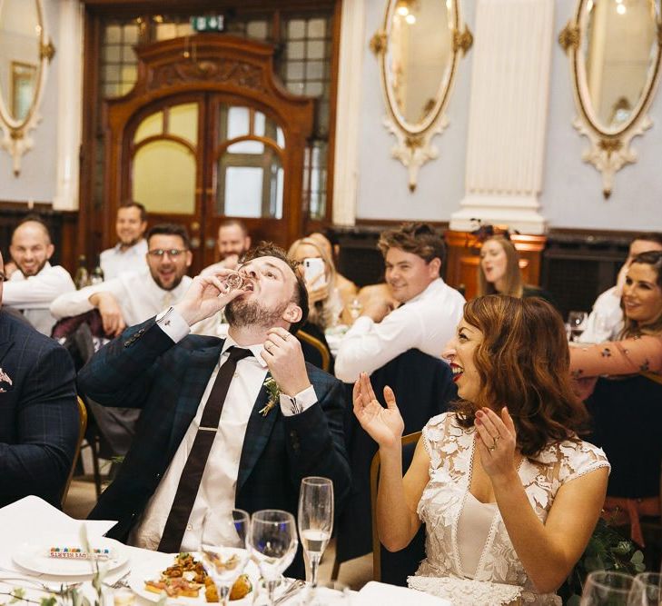 Groom having a vodka jelly hot at London celebration