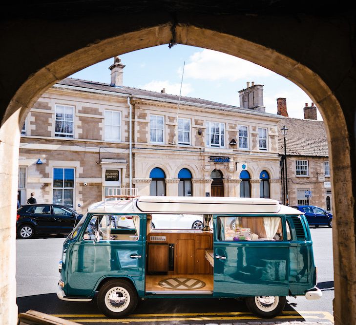 Wedding Transport | Turquoise Camper Van | Edison Bulb Floral Installation at Kingsthorpe Lodge Barn Wedding | Johnny Dent Photography