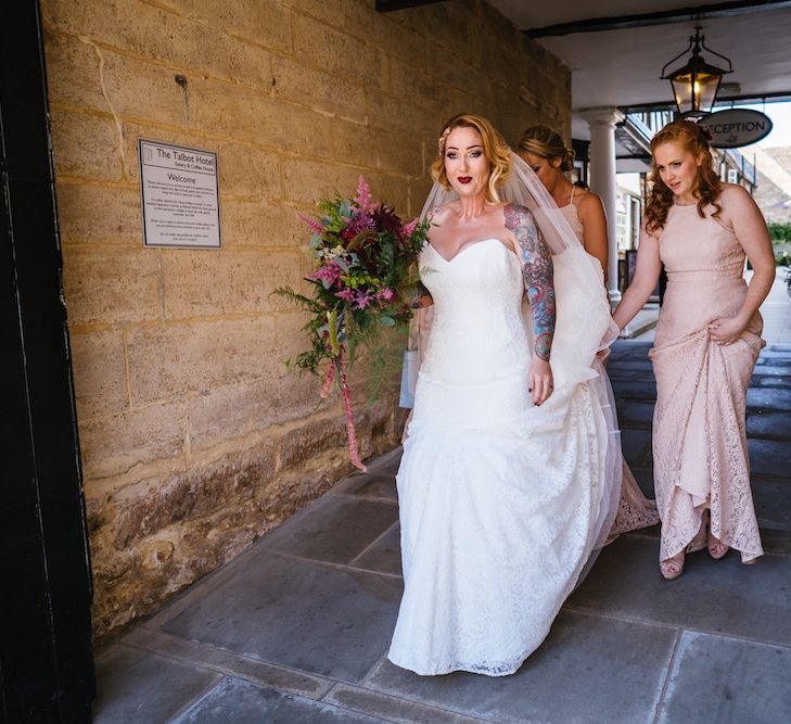 Arrival of the Bride | Bride in Strapless Sassi Holford Wedding Dress with Sweetheart Neckline | Bridesmaids in Pink Dessy Dresses | Edison Bulb Floral Installation at Kingsthorpe Lodge Barn Wedding | Johnny Dent Photography