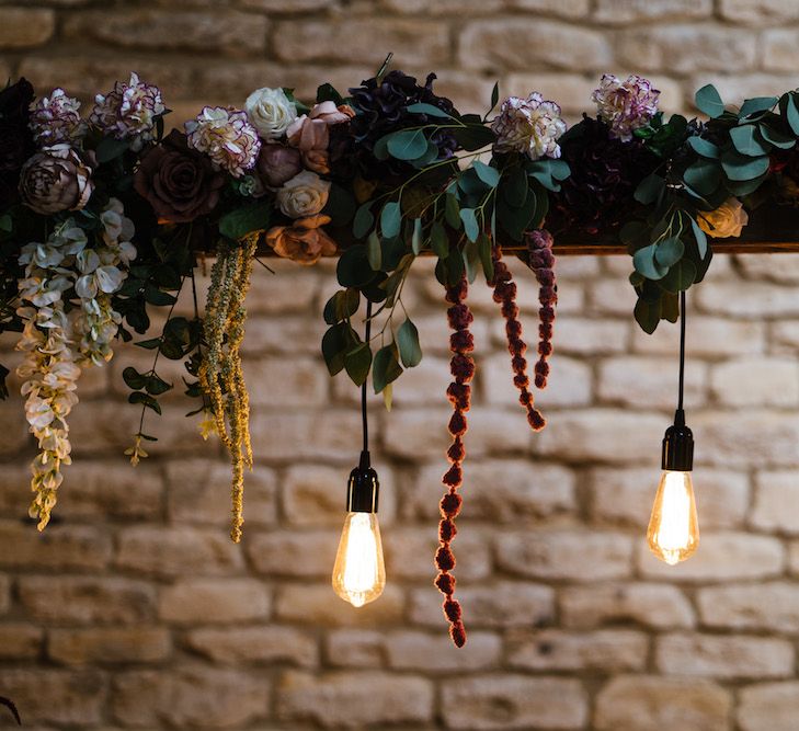 Wedding Reception Decor | Eddison Bulbs Hanging from Floral Installation | Edison Bulb Floral Installation at Kingsthorpe Lodge Barn Wedding | Johnny Dent Photography