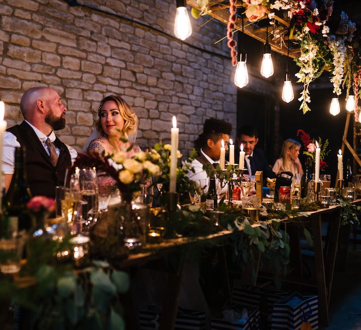 Wedding Reception Decor | Banquet Tables | Edison Bulbs Hanging from Floral Installation | Top Table | Eddison Bulb Floral Installation at Kingsthorpe Lodge Barn Wedding | Johnny Dent Photography