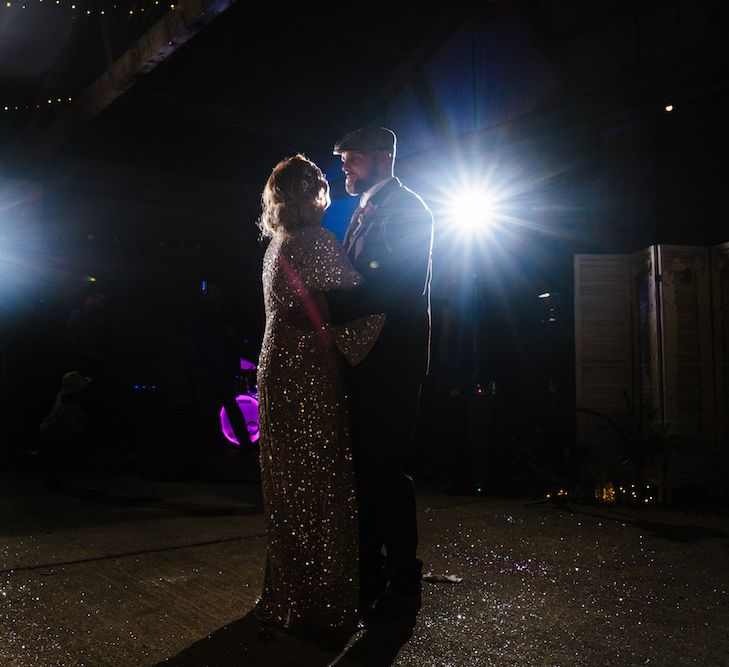 First Dance | Bride in Sequinned Kimono from ASOS | Groom in Burgundy Tweed Three Piece Suit | Edison Bulb Floral Installation at Kingsthorpe Lodge Barn Wedding | Johnny Dent Photography