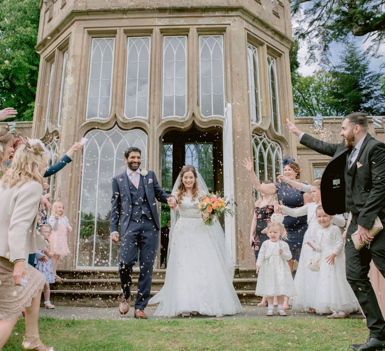 Confetti exit for bride and groom at Culzean Castle wedding in Scotland