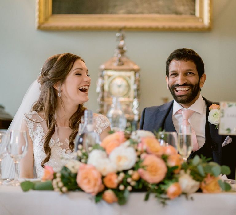 Bride and groom enjoy wedding speeches at Culzean Castle wedding