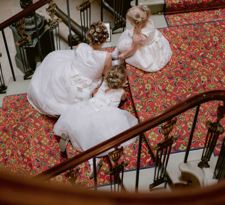 Flower girls in white dresses