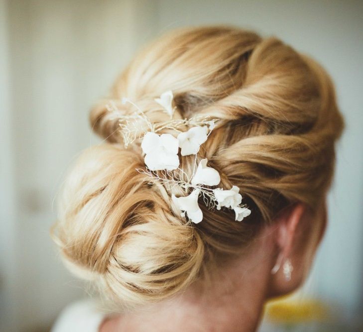 Bridal Up Do with Floral Hairpiece | Quintessential English Country Wedding in Glass Marquee at Family Home | Maryanne Weddings Photography