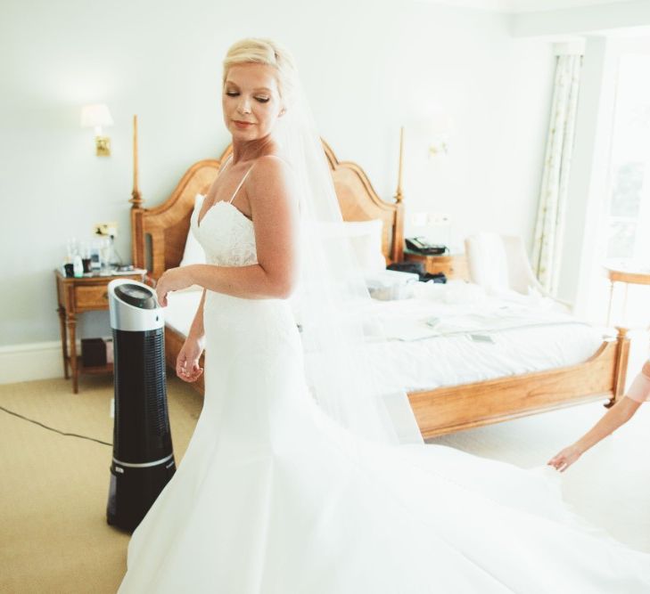 Final Preparations | Bride in Essense of Australia Dress with Spaghetti Straps and Fishtail | Floor Length Veil | Bridesmaid in Soft Pink Cold Shoulder Dress | Quintessential English Country Wedding in Glass Marquee at Family Home | Maryanne Weddings Photography