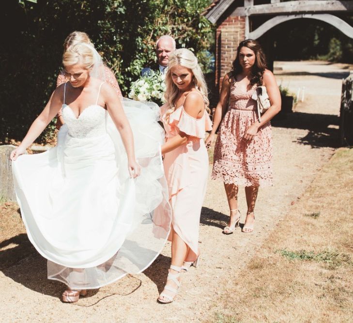 Arrival of the Bride | Bride in Essense of Australia Dress with Spaghetti Straps and Fishtail | Floor Length Veil | Bridesmaids in Mismatched Pink Dresses | Bridal Bouquet of White Flowers and Greenery | Quintessential English Country Wedding in Glass Marquee at Family Home | Maryanne Weddings Photography