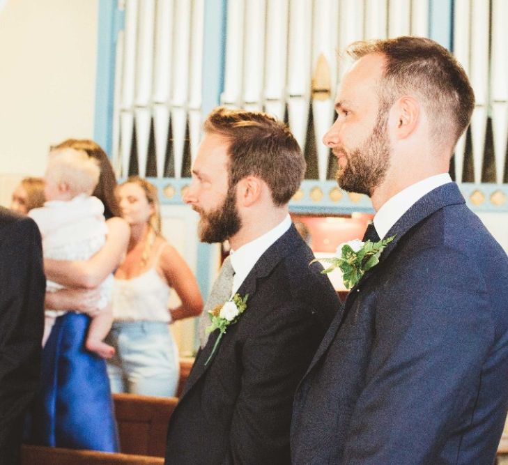 Wedding Ceremony | Groom in Blue Suit with White and Green Buttonhole | Best Man in Navy Moss Bros. Suit | Quintessential English Country Wedding in Glass Marquee at Family Home | Maryanne Weddings Photography