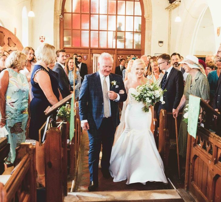 Entrance of the Bride | Bride in Essense of Australia Dress with Spaghetti Straps and Fishtail | Floor Length Veil | Bridal Bouquet of White Flowers and Greenery | Father of the Bride in Navy Blue Check Suit | Quintessential English Country Wedding in Glass Marquee at Family Home | Maryanne Weddings Photography