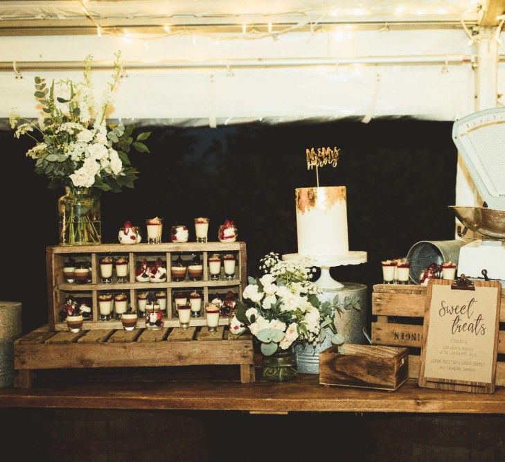 Dessert Table | Rustic Wooden Table with Crates | White Flowers and Eucalyptus | Quintessential English Country Wedding in Glass Marquee at Family Home | Maryanne Weddings Photography