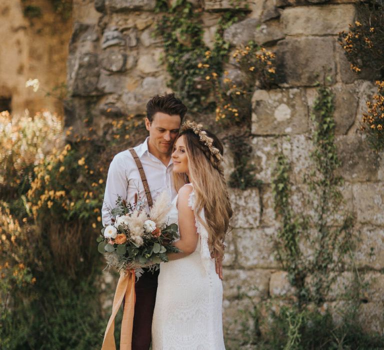 Boho Bride and Groom Embracing