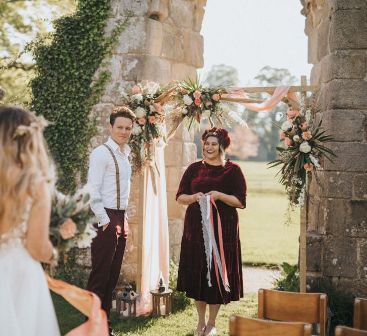 Outdoor Wedding Ceremony with Wooden Fram Altar