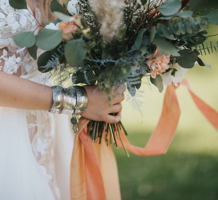 Boho Bride Wearing Silver Bangles