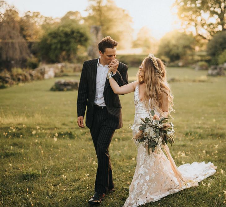 Boho Bride and Groom Walking During Sunset