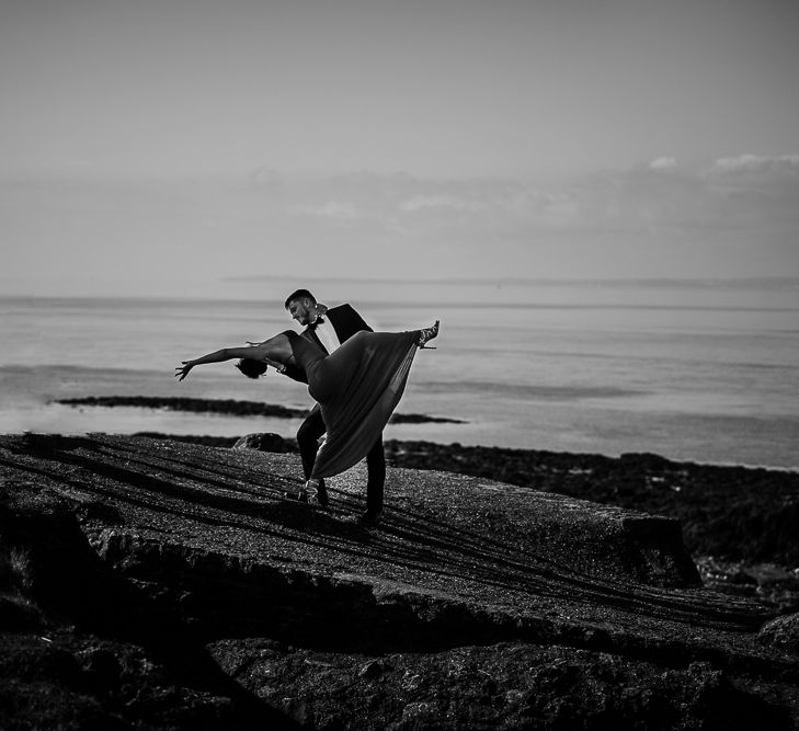 Black tie engagement shoot on the beach by Cat Stephens Photography