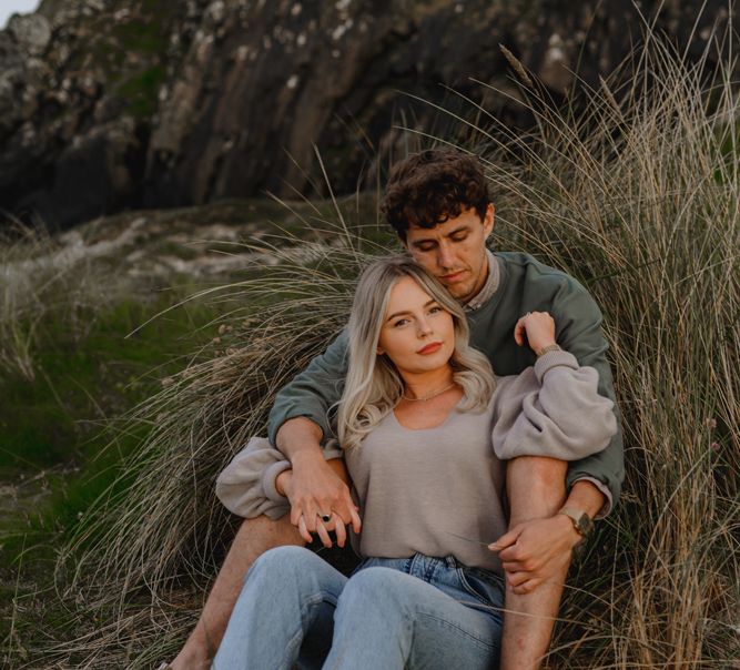 Casual couple on beach engagement photos by LIT Photography