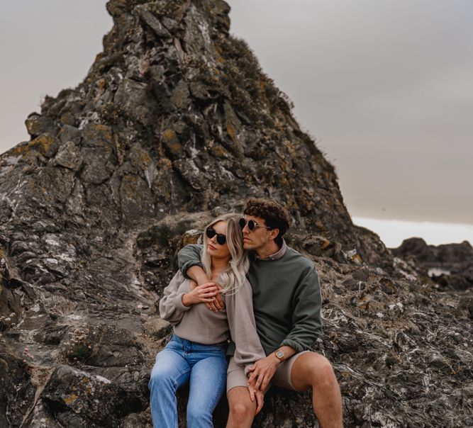 Casual couple on beach engagement shoot by LIT Photography