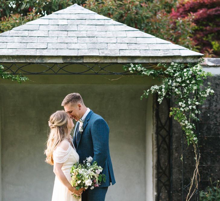 Bride in Rock The Frock Bridal Gown via The Wedding Hub | Groom in Navy Blue Wool Three Piece Suit The Vintage Suit Hire Company | Timeless English Country Garden Inspiration at Boconnoc House and Estate in Cornwall, Styled by On Serpentine Shores | Debs Alexander Photography