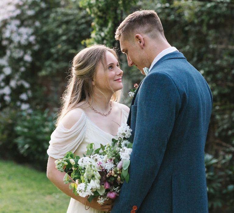 Bride in Bardot Shoulder Rock The Frock Bridal Gown via The Wedding Hub | Groom in Navy Blue Wool Three Piece Suit The Vintage Suit Hire Company | Timeless English Country Garden Inspiration at Boconnoc House and Estate in Cornwall, Styled by On Serpentine Shores | Debs Alexander Photography