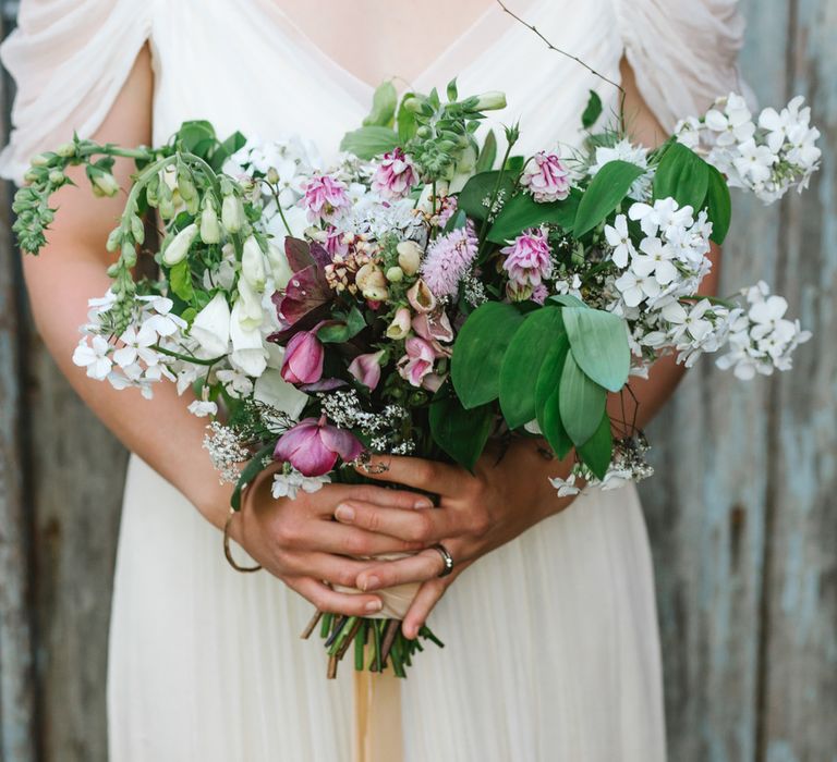 The Garden Gate Flower Company Wedding Bouquet | Bride in Bardot Shoulder Rock The Frock Bridal Gown via The Wedding Hub | Timeless English Country Garden Inspiration at Boconnoc House and Estate in Cornwall, Styled by On Serpentine Shores | Debs Alexander Photography