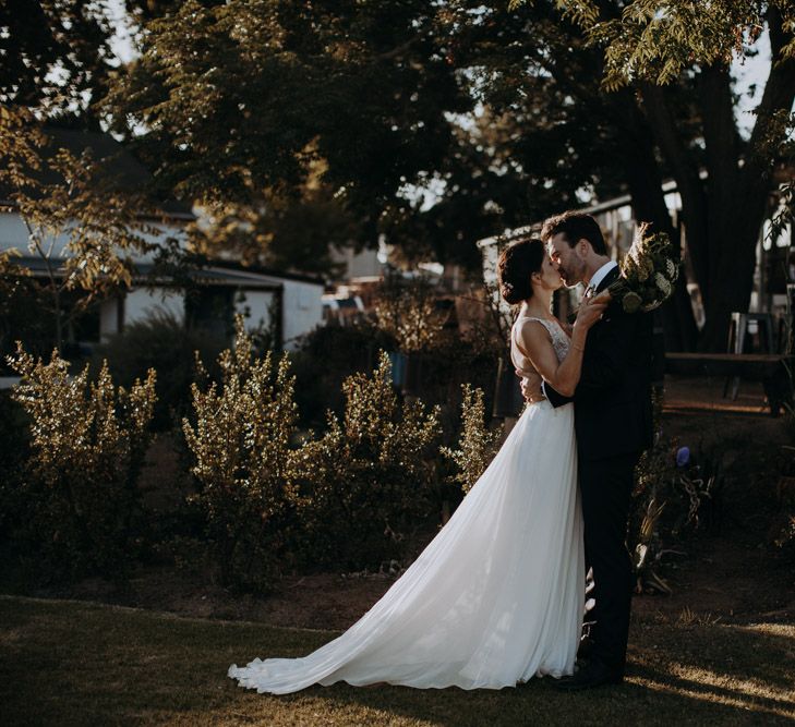 Bride in Elbeth Gillis Couture Bridal Gown | Groom in Hugo Boss Suit | Destination Wedding at The Modern Heirloom at Overgaauw Wine Estate in South Africa | Fiona Clair Photography