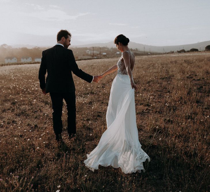 Bride in Elbeth Gillis Couture Bridal Gown | Groom in Hugo Boss Suit | Destination Wedding at The Modern Heirloom at Overgaauw Wine Estate in South Africa | Fiona Clair Photography