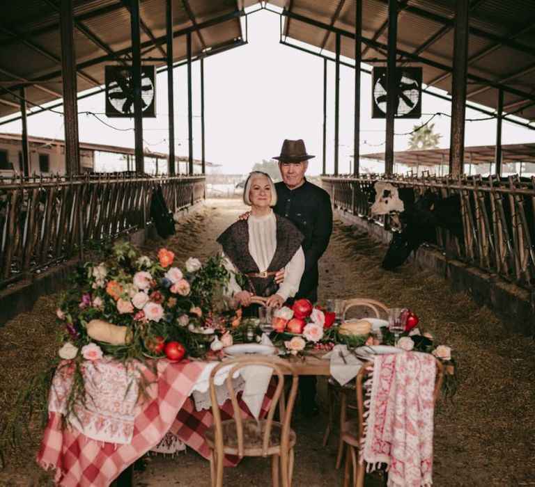 Couple celebrating their golden wedding anniversary with feast