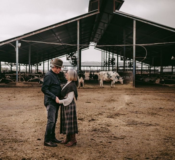 couple celebrating their golden wedding anniversary at their cattle shed