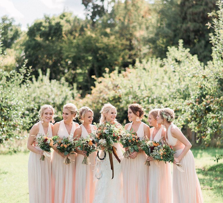 Bridesmaids In Pale Pink Dresses // Macrame Ceremony Backdrop Rustic Hippie Wedding The Great Barn Dream Catchers And Oversized Florals Bride In Essence Of Australia Images Kathryn Hopkins