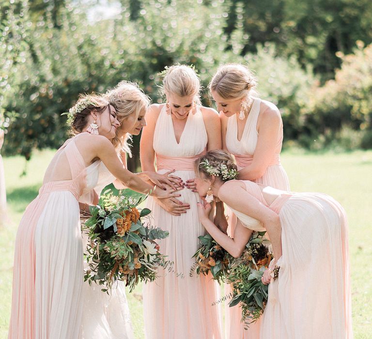 Bridesmaids In Pale Pink Dresses // Macrame Ceremony Backdrop Rustic Hippie Wedding The Great Barn Dream Catchers And Oversized Florals Bride In Essence Of Australia Images Kathryn Hopkins