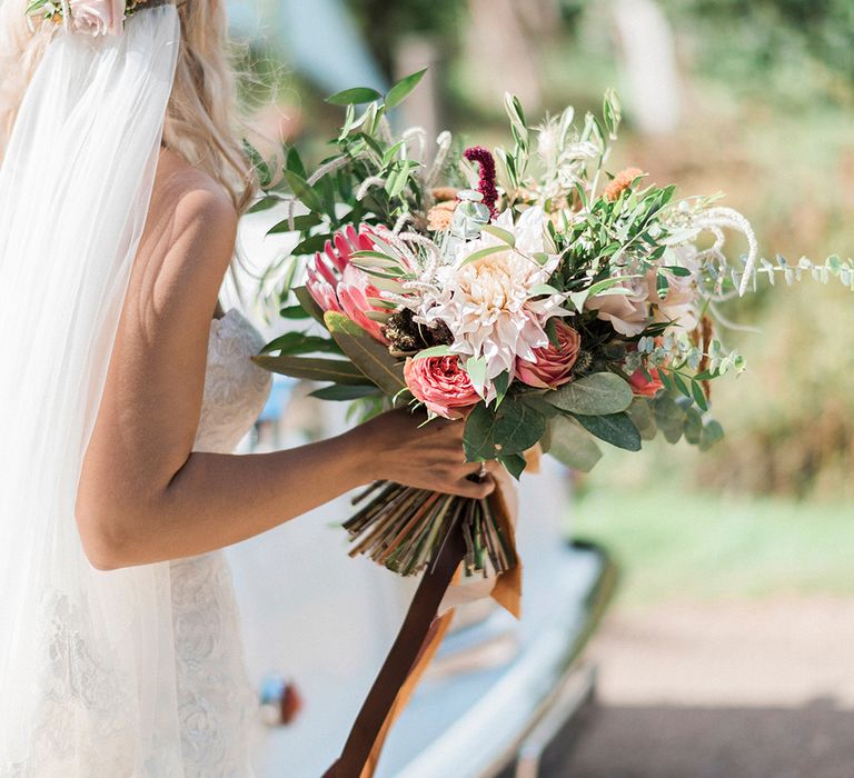 Protea Wedding Bouquet // Macrame Ceremony Backdrop Rustic Hippie Wedding The Great Barn Dream Catchers And Oversized Florals Bride In Essence Of Australia Images Kathryn Hopkins