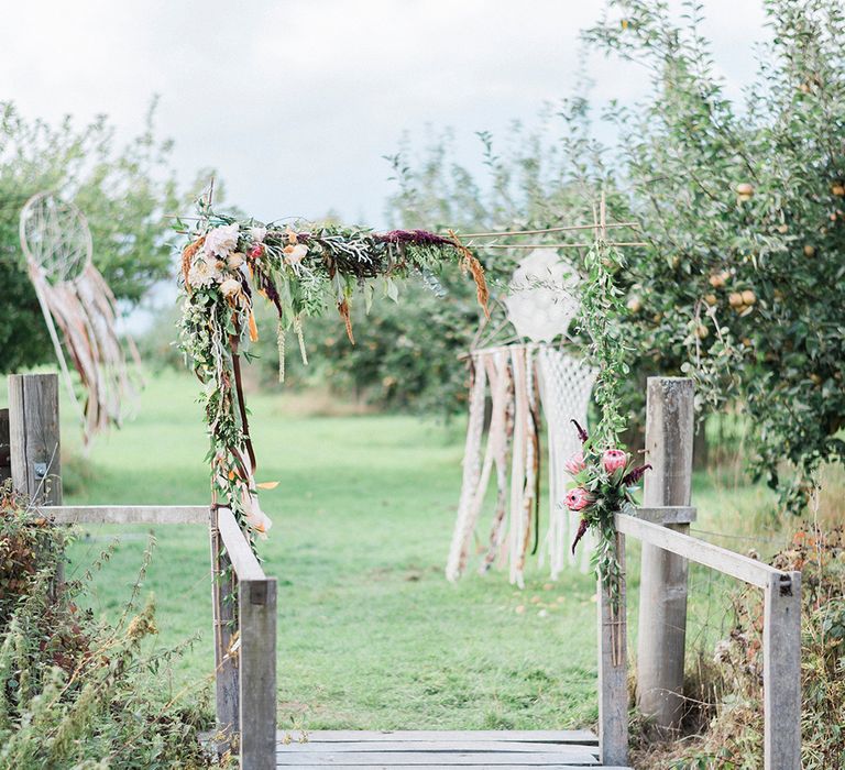 Dream Catcher Wedding Decor // Macrame Ceremony Backdrop Rustic Hippie Wedding The Great Barn Dream Catchers And Oversized Florals Bride In Essence Of Australia Images Kathryn Hopkins