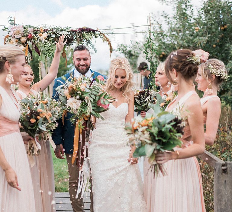 Protea Wedding Bouquet // Macrame Ceremony Backdrop Rustic Hippie Wedding The Great Barn Dream Catchers And Oversized Florals Bride In Essence Of Australia Images Kathryn Hopkins