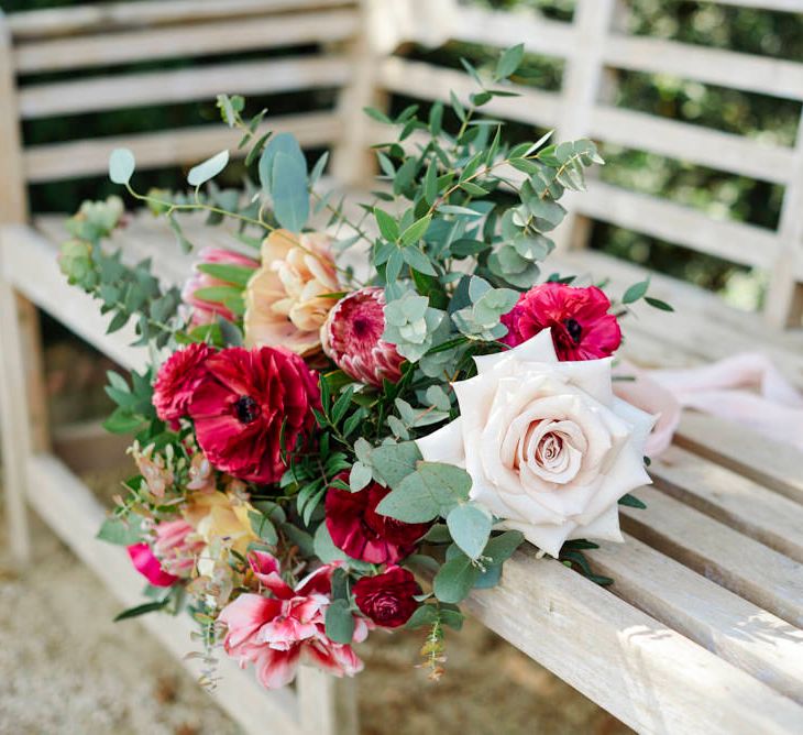 Bridal Bouquet With Pale Pink Roses And Berry Coloured Anemones