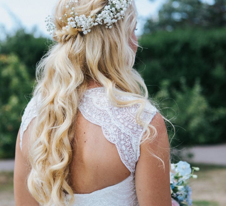 Bride in Sophia Tolli Galene Wedding Dress with Keyhole Back Detail and Half Half Down Wavy Wedding Hair