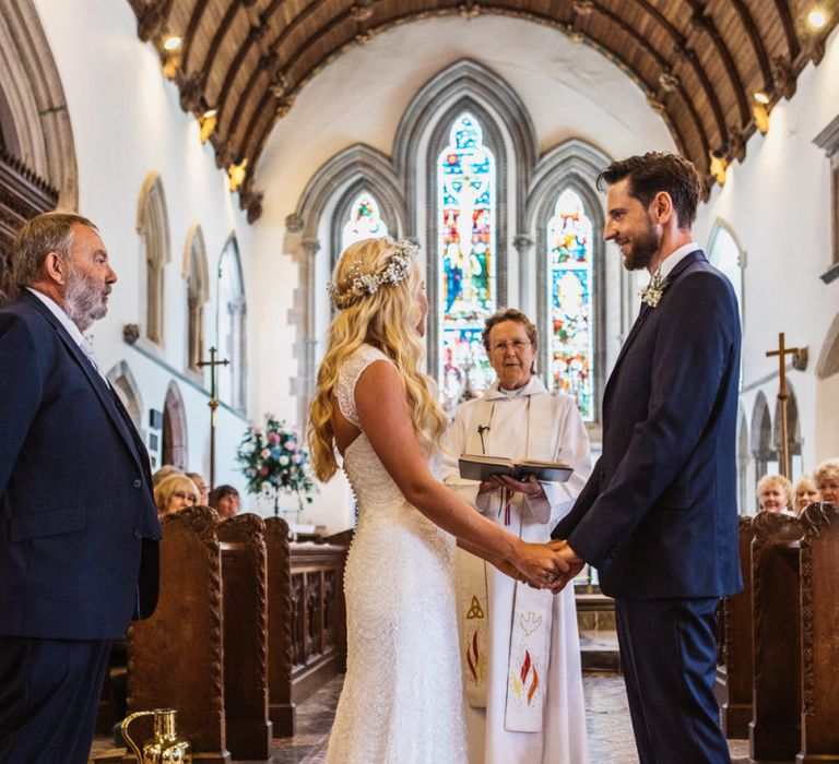 Church Wedding Ceremony with Bride in Sophia Tolli Galene Wedding Dress and Groom in Navy Blue Ted Baker Suit