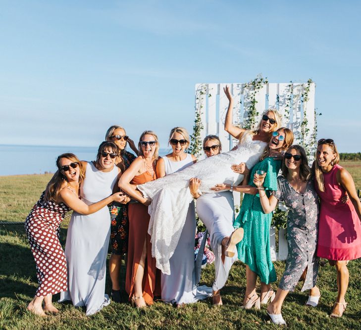 Bride in Sophia Tolli Wedding Dress and Female Wedding Guests