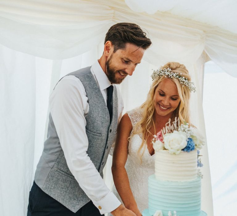 Bride and Groom Cutting tHe Blue Ombre Wedding Cake