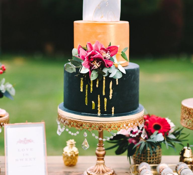 Three Tier Wedding Cake with Black, Gold and White Layers