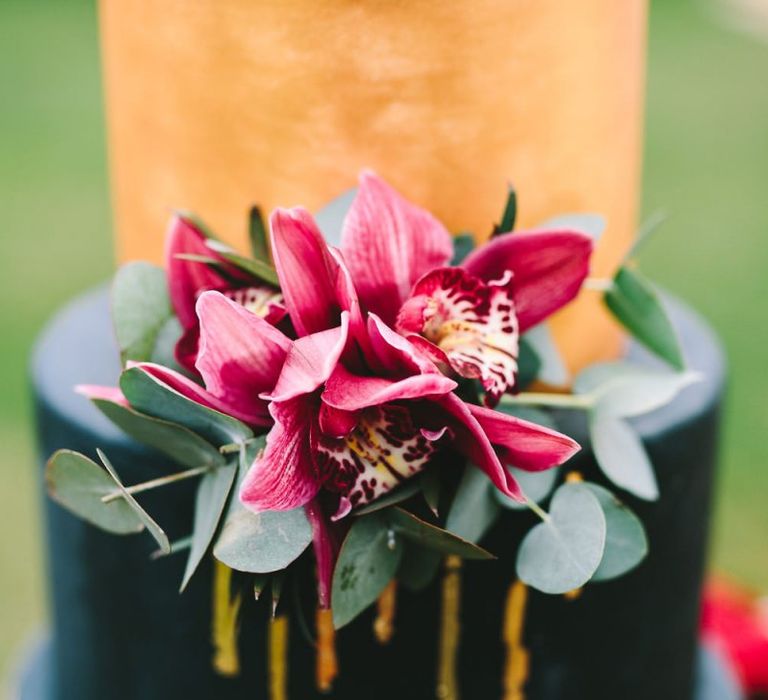 Pink Flowers on the Front of the Wedding Cake