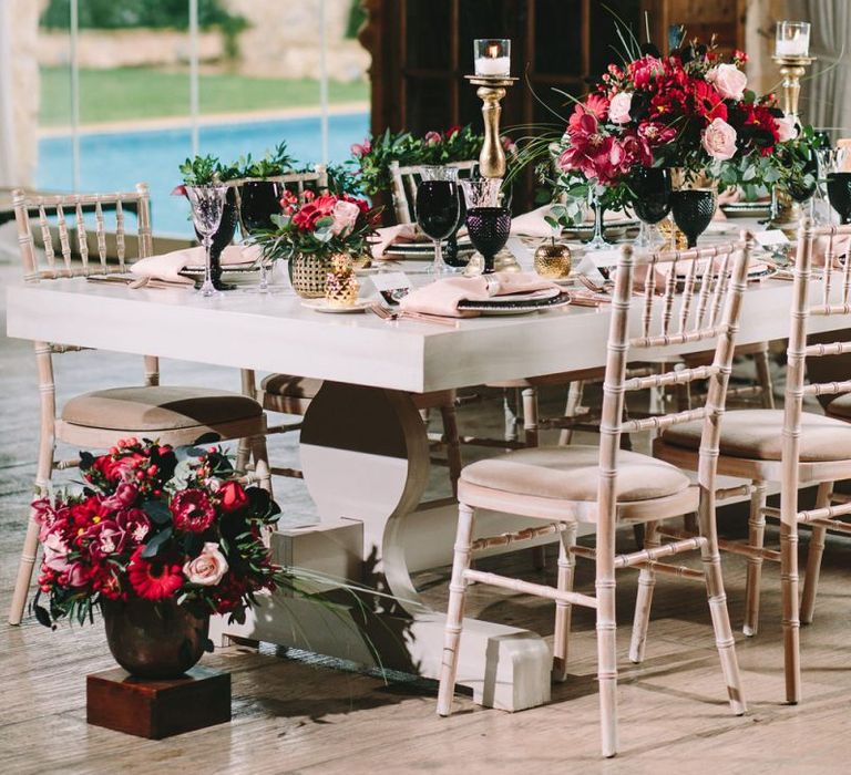 Red and Black Floral Arrangements and Tableware