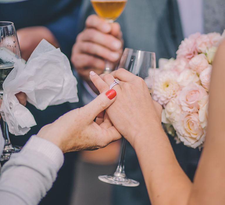 A Quintessentially British Venue at Cambridge Cottage, Royal Botanic Gardens Kew. Bride Wears Paloma Blanca from Pure Couture Bridal and Groom Wears Tailored Suit from Hackett London.