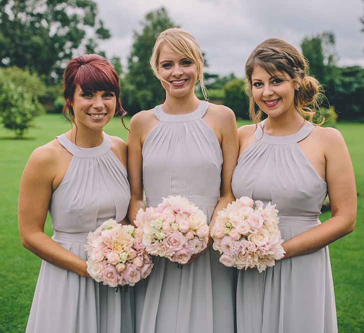 Bridesmaids Warehouse Dresses from ASOS. A Quintessentially British Venue at Cambridge Cottage, Royal Botanic Gardens Kew. Bride Wears Paloma Blanca from Pure Couture Bridal and Groom Wears Tailored Suit from Hackett London.